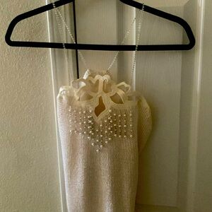 Sweater with rhinestone straps and beading hang down of see through appliqué